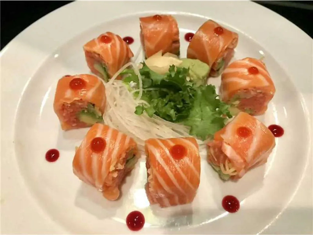 Salmon Sushi Rolls consist of vinegared rice and fresh salmon wrapped in seaweed at Blue Wazabi, a Japanese restaurant in NJ