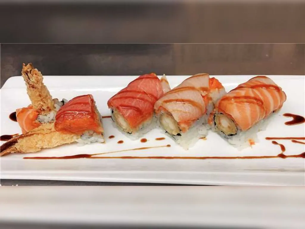 Salmon and Shrimp Sushi combines vinegared rice with slices of fresh salmon and shrimp at Blue Wazabi, a Japanese restaurant in NJ